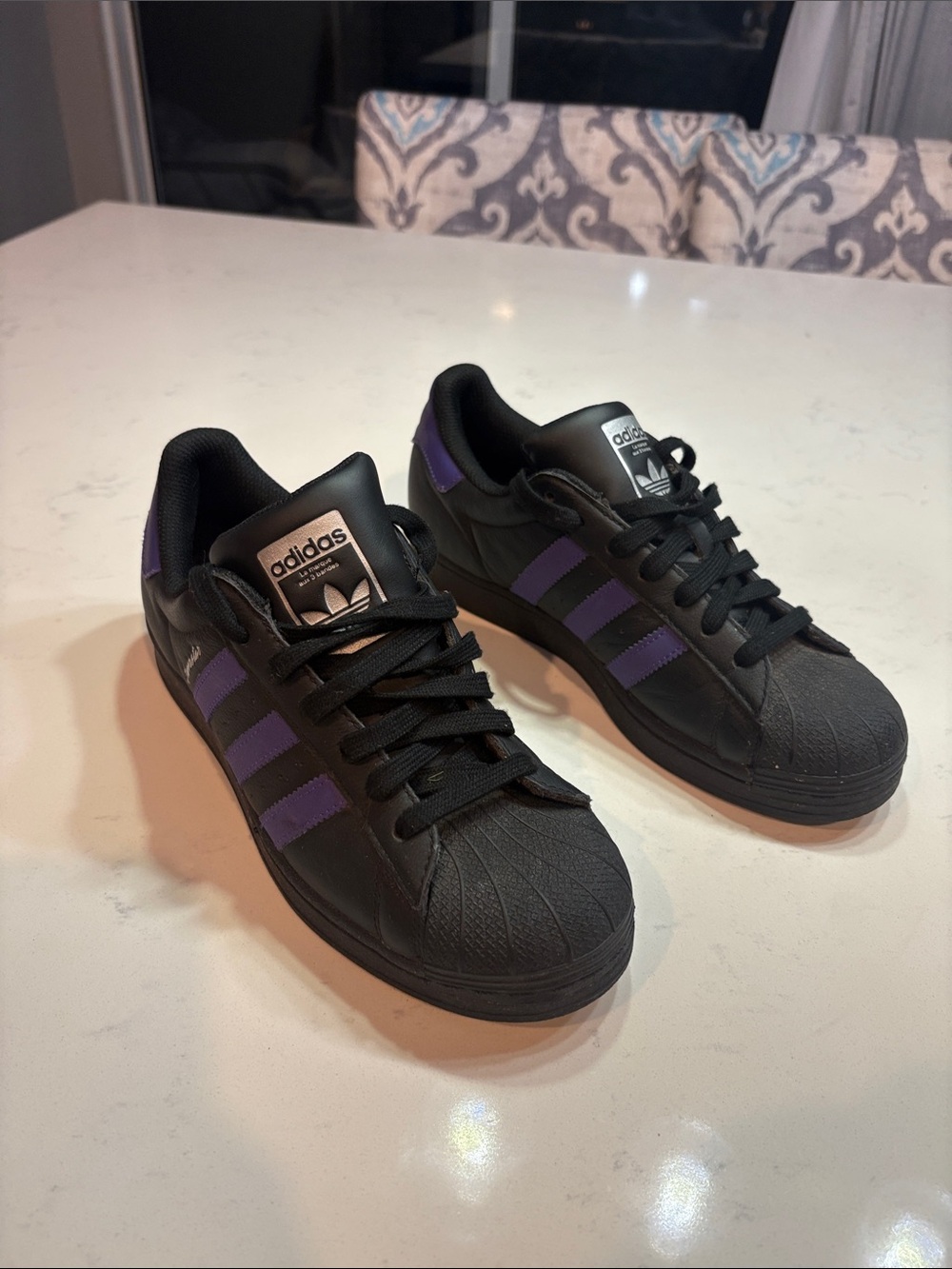 adidas Women’s Black Sneakers with Purple Stripes